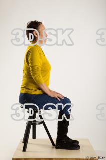Sitting reference of yellow sweater blue jeans Gwendolyn 0005